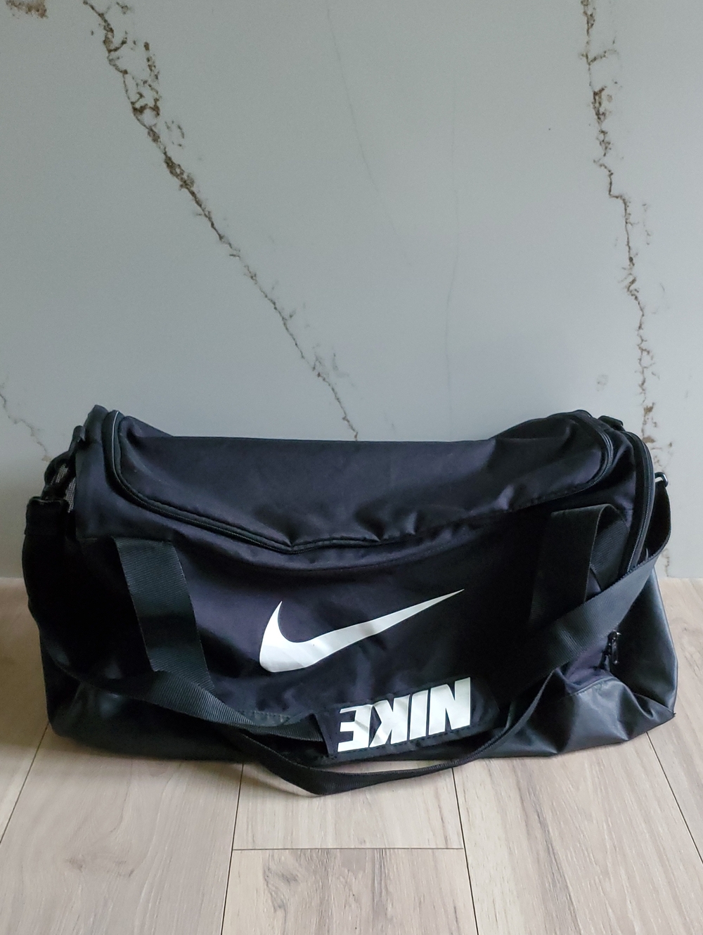 Nike Black Duffel Bag with White Swoosh